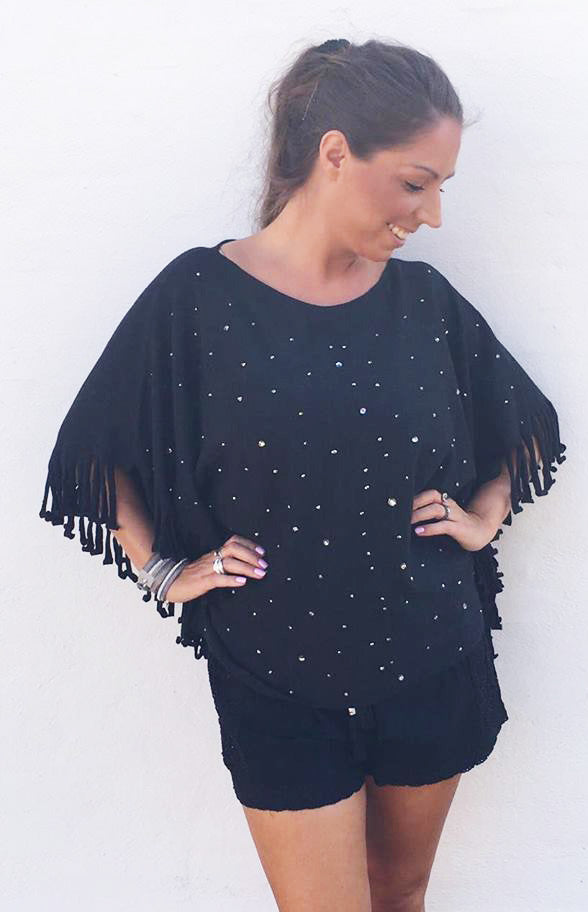 Poncho med glitter i sort