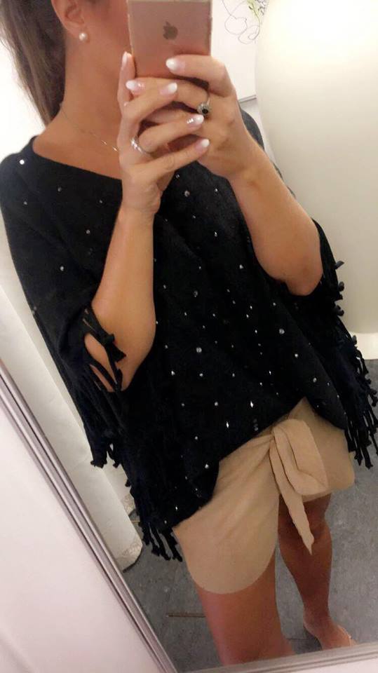 Poncho med glitter i sort