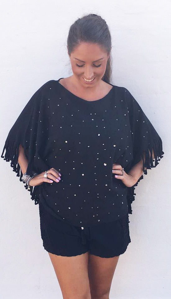 Poncho med glitter i sort