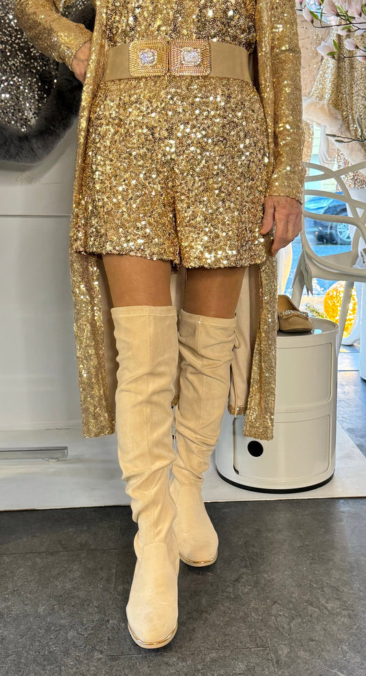 Shorts i små guld pailletter